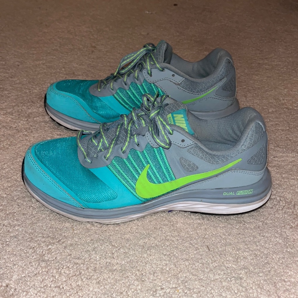 Nike green and blue running shoes. Size 8.